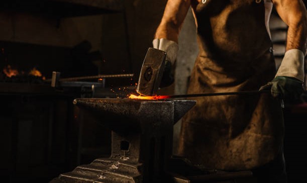 Medieval Blacksmith forging a sword